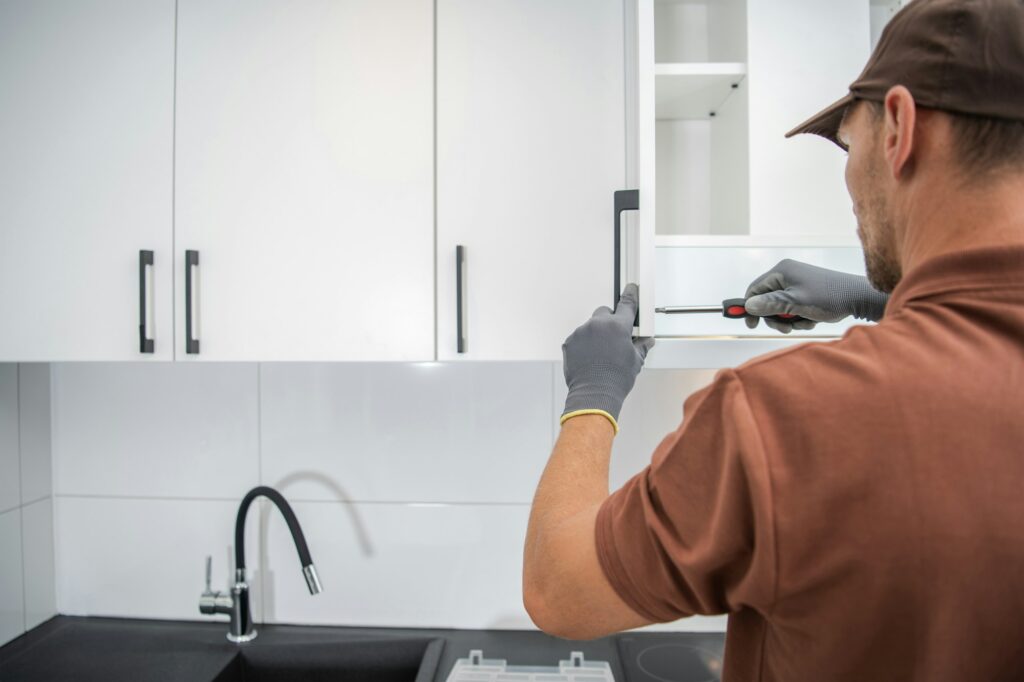 Cabinetmaker Finishing Residential Kitchen Cabinets Installation