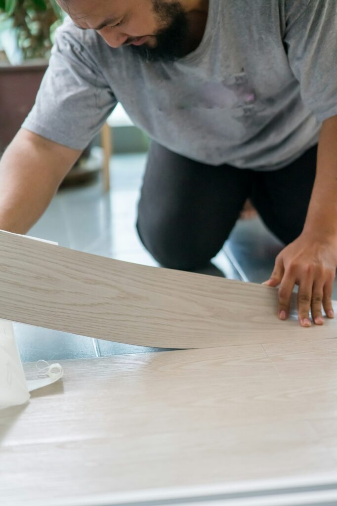 installing vinyl flooring at home, DIY renovation project